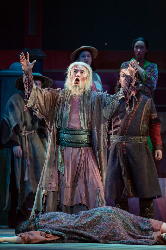 Bass Young Bok Kim mourns the loss of Liu.  Photo by Rod Millington and Sarasota Opera