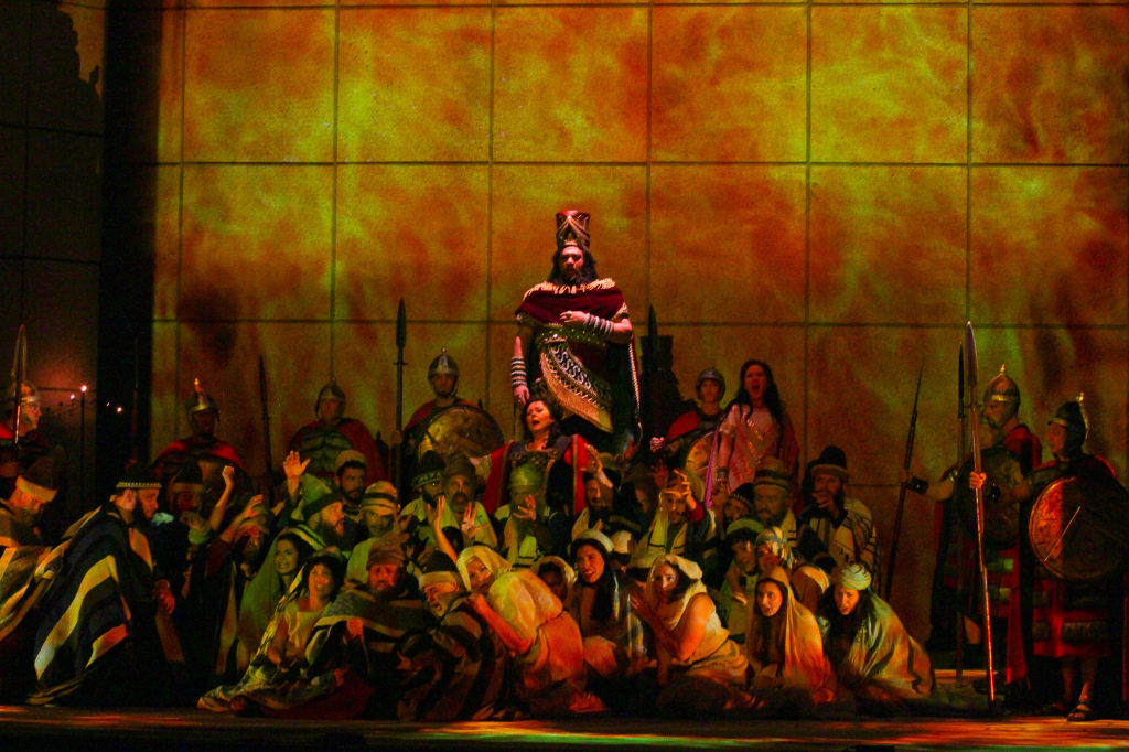 Gordon Hawkins as Nabucco, Brenda Harris as Abigaille and the Opera Carolina Chorus. Photo by jonsilla.com